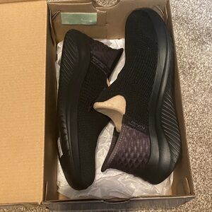 Skechers Black Slip-On Knit Sneakers with Purple Heel Collar